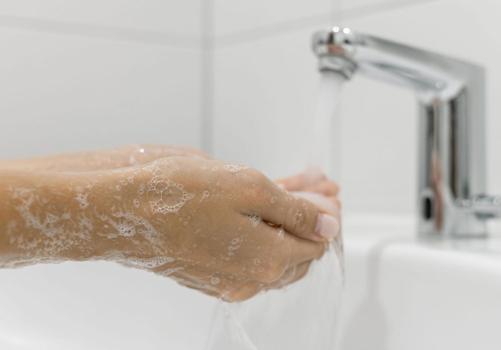 sideways-person-washing-hands